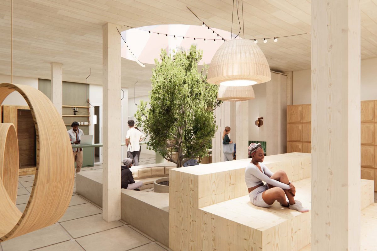 Innenarchitektur München - New Work Bürogestaltung, heller offener Bereich mit Pflanzen mitten im Raum